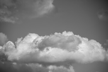 sky with white clouds black and white photo
