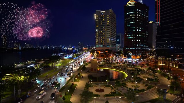 Celebration. Skyline with fireworks light up sky over Saigon downtown in Ho Chi Minh City, Vietnam. Holidays, celebrating New Year and Tet holiday.