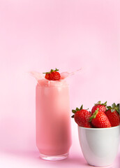  Splash in strawberries in glass