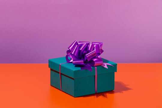 Bright gift box with bow and ribbons