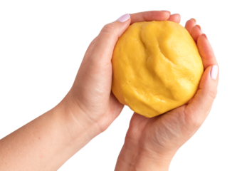 Yellow dough for cookies in the hands of a baker, on a transparent background. isolated object. Element for design