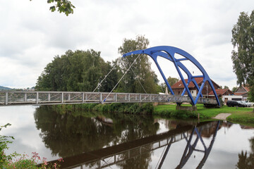 Fototapeta premium Blue Bridge crossing the river Regen in the town of Cham, Germany
