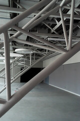 Ventilation System Under Ceiling of Modern Warehouse or Shopping Center. Metal Piping for Air Conditioning