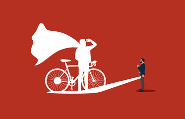 Business superhero cyclist concept with businessman and flashlight. Symbol of ambition, motivation and inspiration.