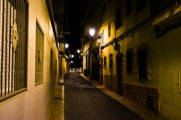 A narrow street in Benidorm - Old Town at nighttime