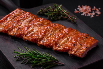 Delicious fresh grilled or smoked ribs with salt, spices and herbs