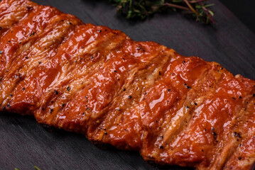 Delicious fresh grilled or smoked ribs with salt, spices and herbs