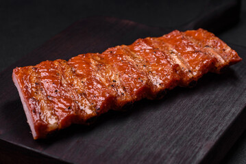 Delicious fresh grilled or smoked ribs with salt, spices and herbs