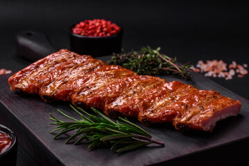 Delicious fresh grilled or smoked ribs with salt, spices and herbs