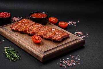 Delicious fresh grilled or smoked ribs with salt, spices and herbs