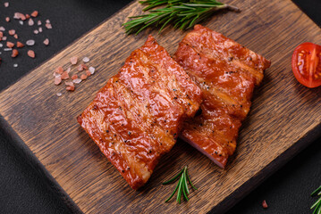 Delicious fresh grilled or smoked ribs with salt, spices and herbs