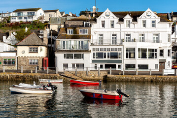 Boats moored at Polpero harbour Cornwall UK