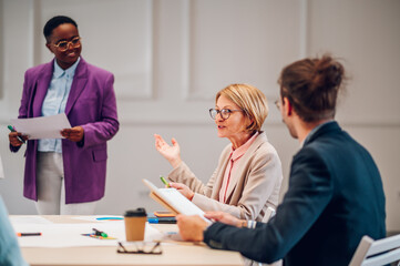 Multiracial business group of people having a meeting in an office