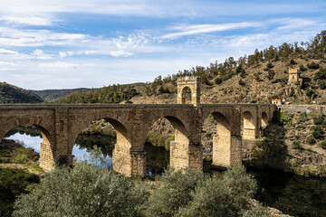 Fototapeta premium Roman bridge over the Tagus, Tajo river in Alcantara, Caceres province, Extremadura, Spain
