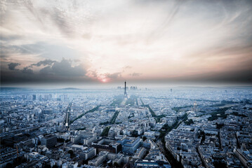 Bird's Eye Paris: A breathtaking perspective of the city streets with a gorgeous sky and the iconic Eiffel Tower far away