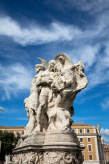 Fototapeta na wymiar Statue on bridge Sant Peter square during sunny day in Vatican city, Italy