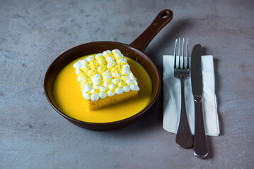 Saffron Milk Cake served in dish isolated on grey background top view of bahrain food