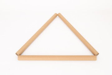 triangle of cardboard sleeves on a white background