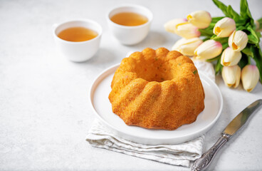 Candied fruits sweet cake with a cup of tea