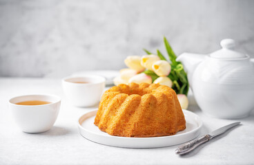 Candied fruits sweet cake with a cup of tea
