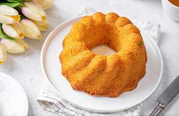 Candied fruits sweet cake with a cup of tea
