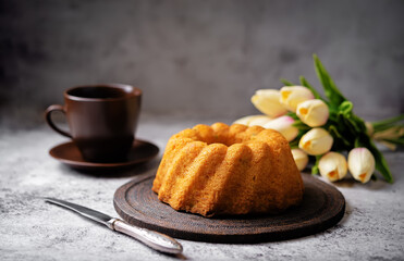 Candied fruits sweet cake with a cup of tea