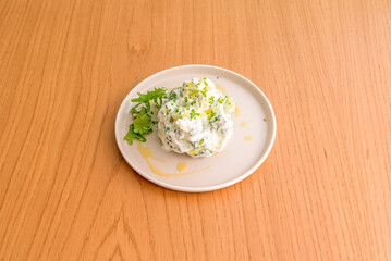 Tzatziki, the Greek version of cacık, is a cucumber and yogurt-based sauce, consumed in many dishes, especially meat