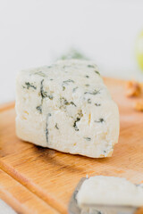Blue cheese and pears on the cutting board