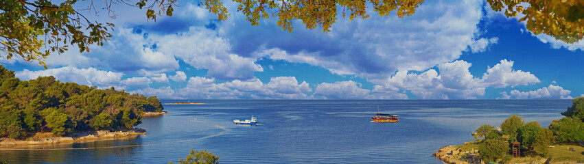 Wonderful romantic summer afternoon landscape panorama sea. Green lagoon sea bay in Porec, Croatia - Istria, Europe - 585924825