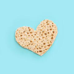 Pesah celebration concept (jewish Passover holiday) over pastel blue background