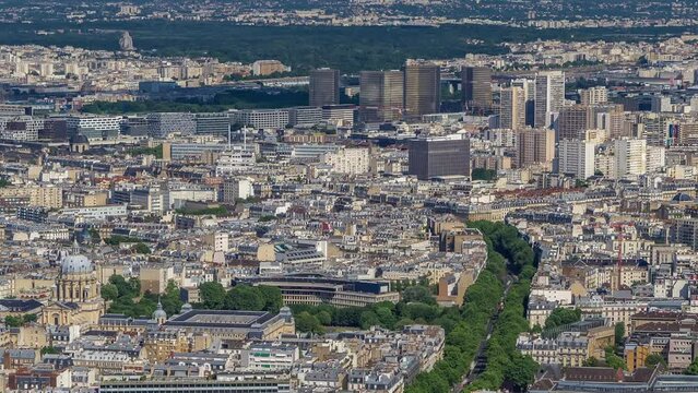 Top view of Paris skyline with National Library of France from above timelapse. Main landmarks of european megapolis. Bird-eye view from observation deck of Montparnasse tower. Paris, France
