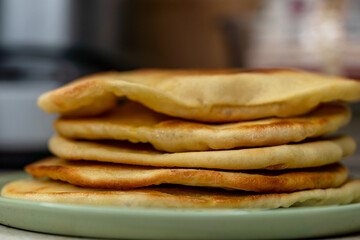 Homemade Indian Naan Flatbread made with Whole Wheat flour, with garlic and oil on top