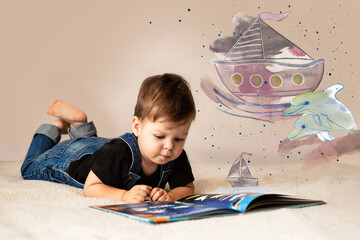 The child reads a book while lying on the bed and imagines dolphins, ships and adventures.