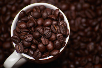 The cup of coffee beans high detailed close up view