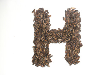 Alphabet made from Sunflower Seeds