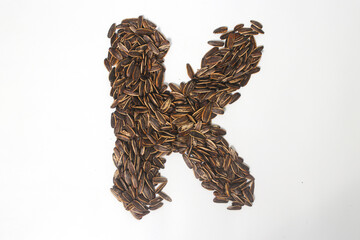 Alphabet made from Sunflower Seeds