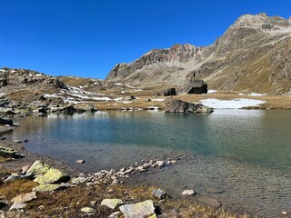 Fototapeta na wymiar High alpine lakes next to the mountain hut (Chamanna da Grialetsch CAS or Grialetsch-Hütte SAC) in the massif of the Albula Alps, Zernez - Canton of Grisons, Switzerland (Kanton Graubünden, Schweiz)