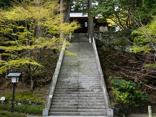 Tokushima, Japan - April 4, 2018: Steep steps leading to the gate of Tairyuji, temple number 21 of Shikoku pilgrimage