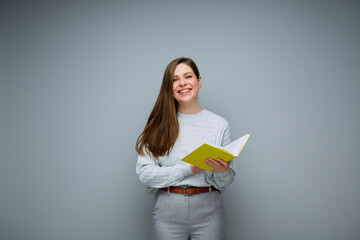 Happy teacher woman or student girl holding open book isolated portrait.