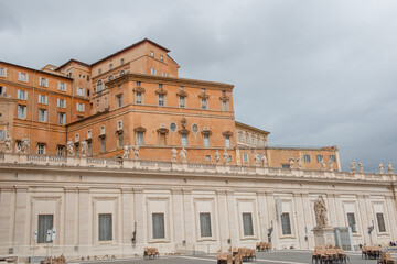 Fototapeta na wymiar Brick-colored house overlooking St. Peter's square