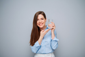 Happy business woman holding water glass.