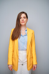 Smiling woman in yellow jacket. Isolated female portrait.