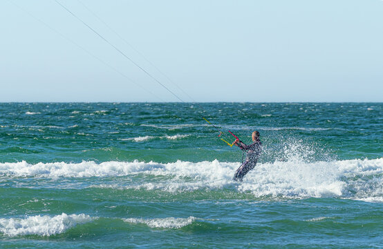Kite surfers water sport event at neach in Zeeland