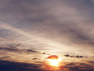 Dark dramatic sunset sky with white clouds. Background for design purpose and sky replacement.