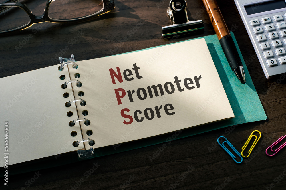 Poster there is a notebook with the word net promoter score. it is eye-catching image.