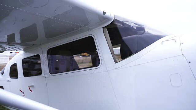 View From The Outside Of A Cessna Plane Cockpit Through Its Windows. closeup