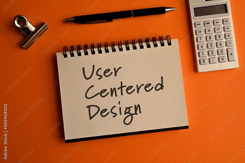 Poster there is a notebook with the word user centered design. it is eye-catching image.