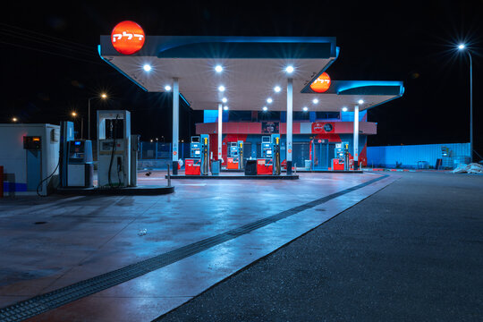 Gas station at night with cold and hot lights