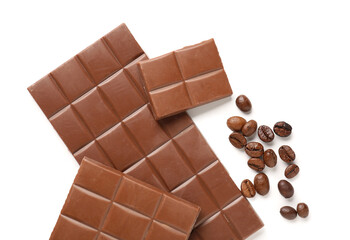Tasty chocolate and coffee beans on white background, closeup