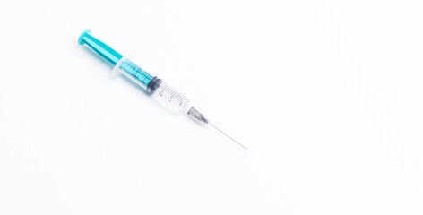 Disposable plastic syringe prepared for injection and vaccination in the hospital. The concept of medicine and health